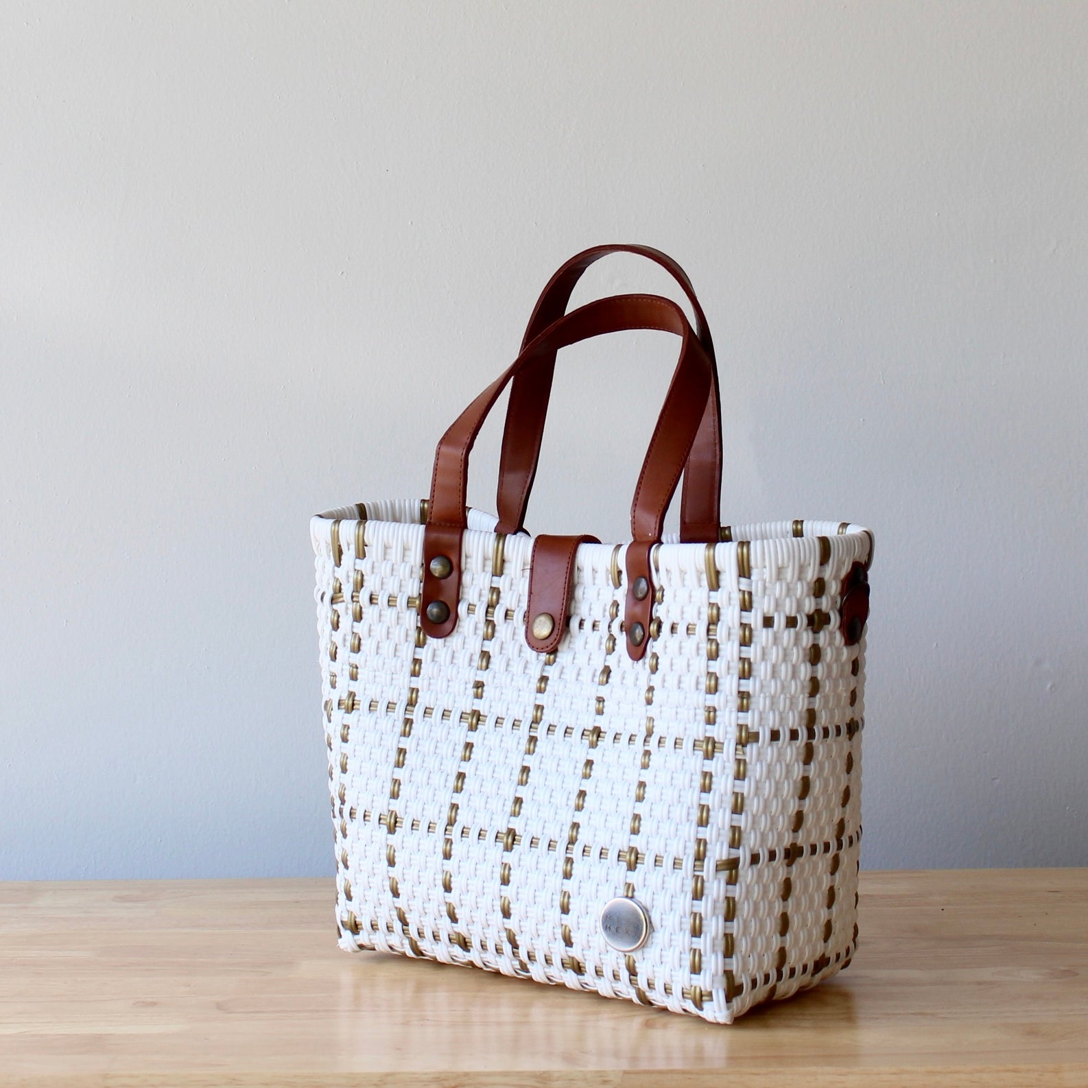 Eco-friendly woven purse in white with earthy accents
