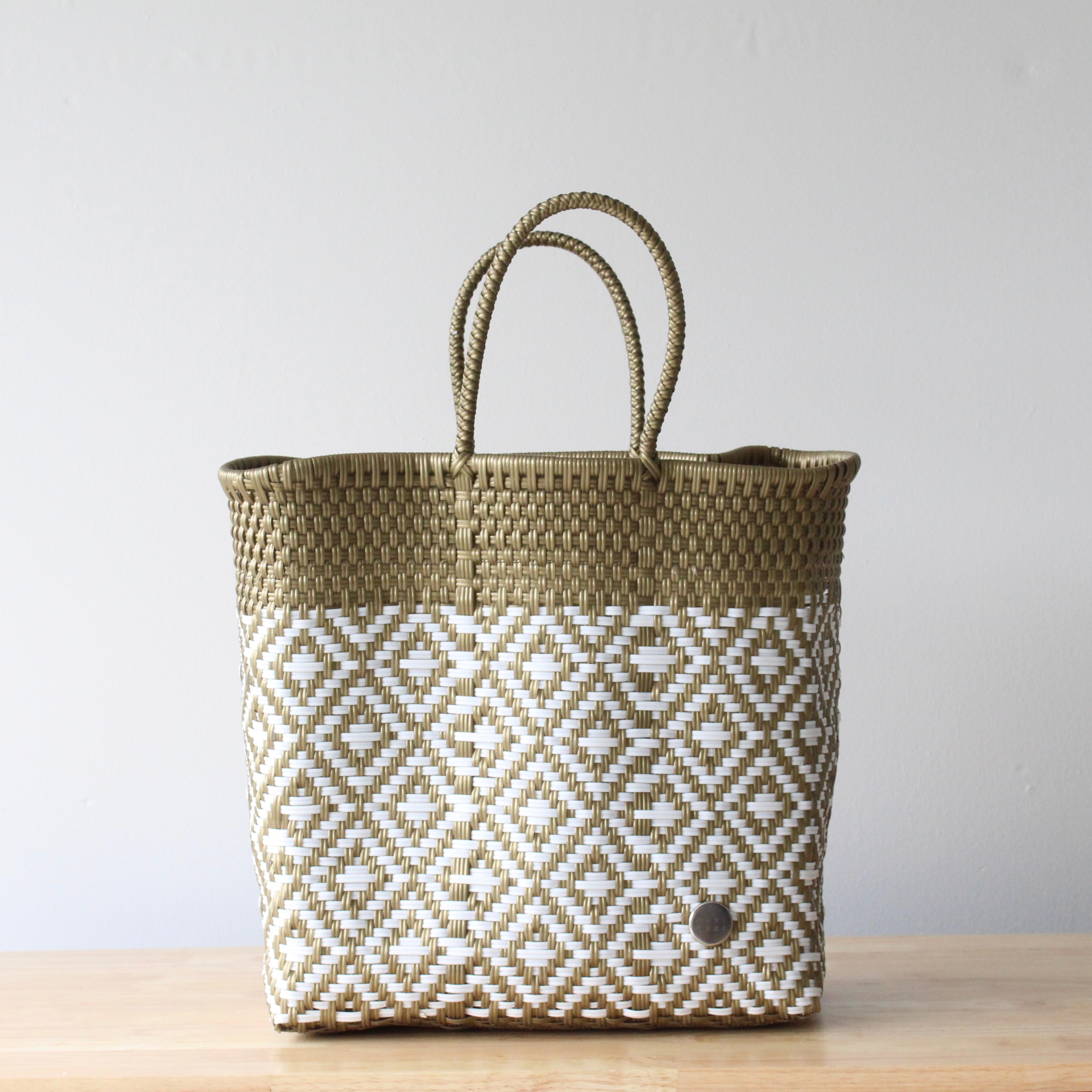 Medium gold and white Mexican woven plastic tote bag handmade in Mexico