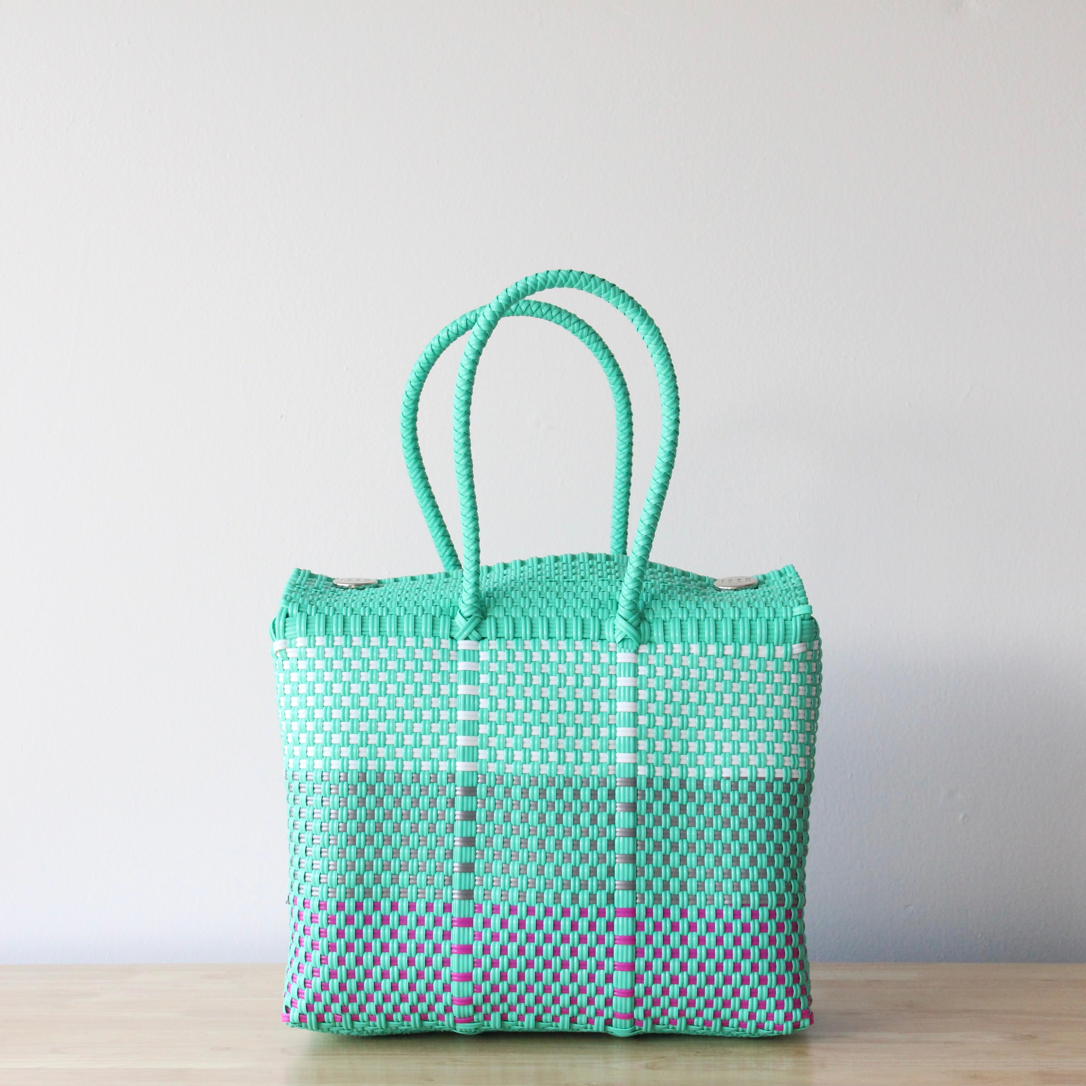 Medium handwoven Mexican handbag in aqua with white and fuchsia details