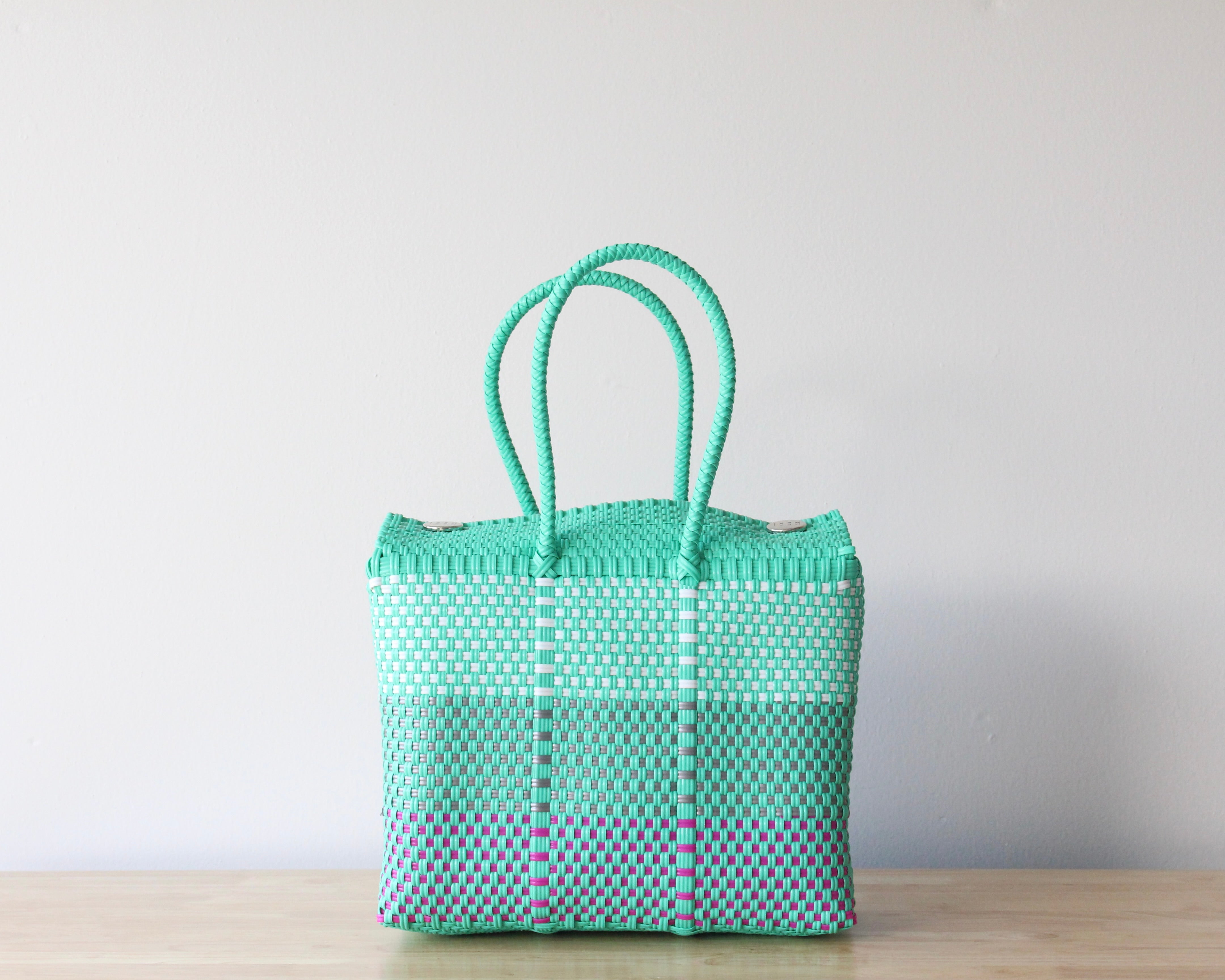 Medium handwoven Mexican handbag in aqua with white and fuchsia details