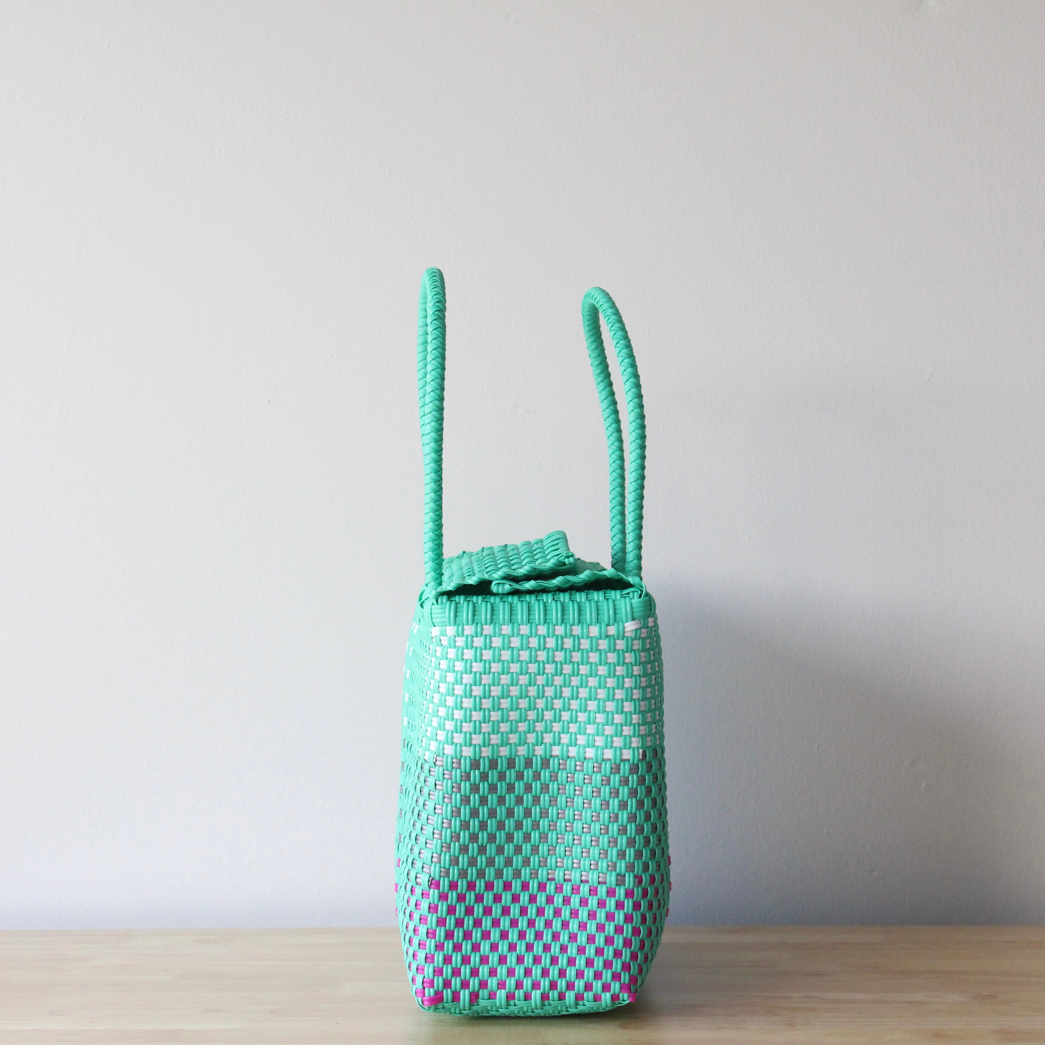 Colorful MexiMexi handbag with snap closure and woven plastic design