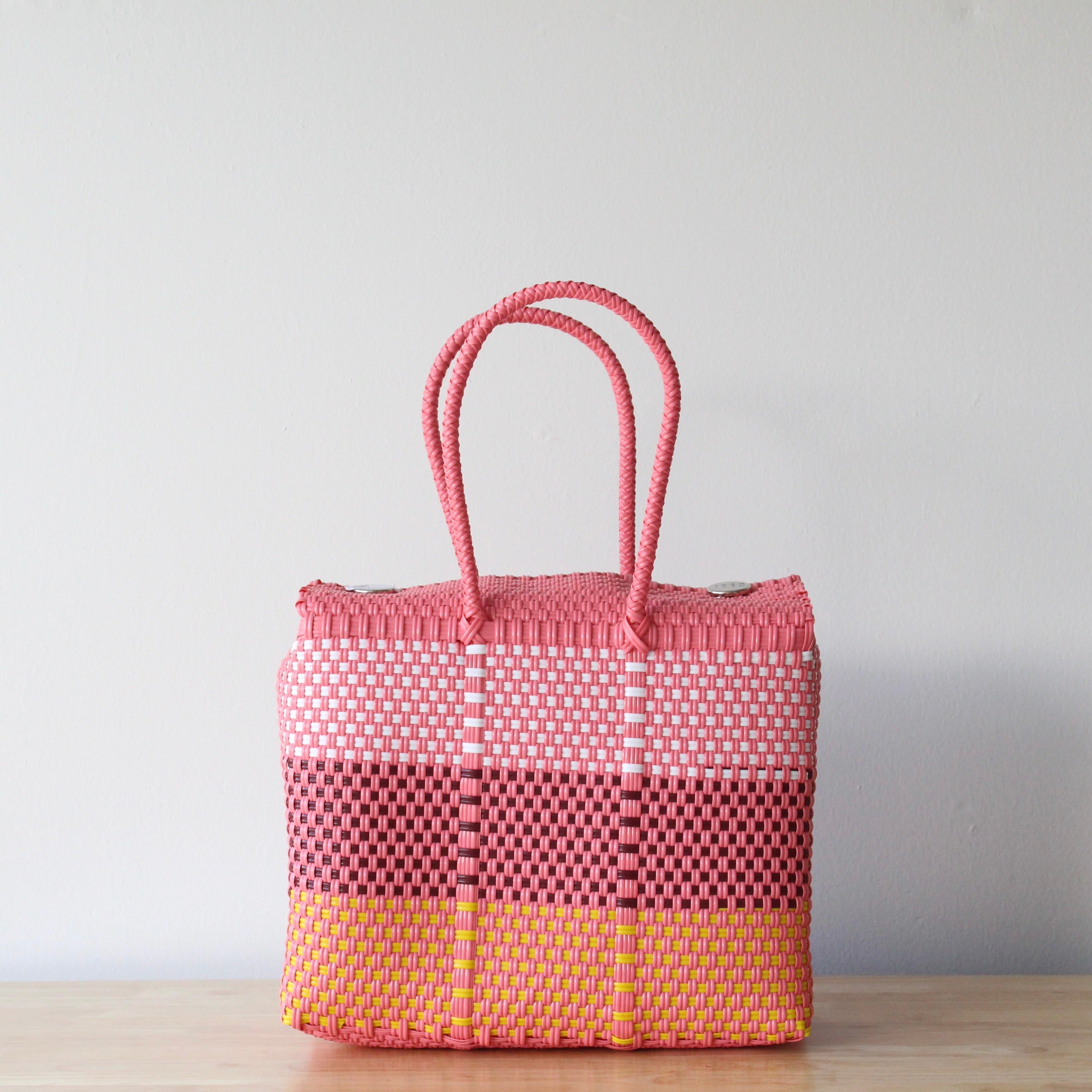 Medium handwoven Mexican handbag in pink, coral and yellow