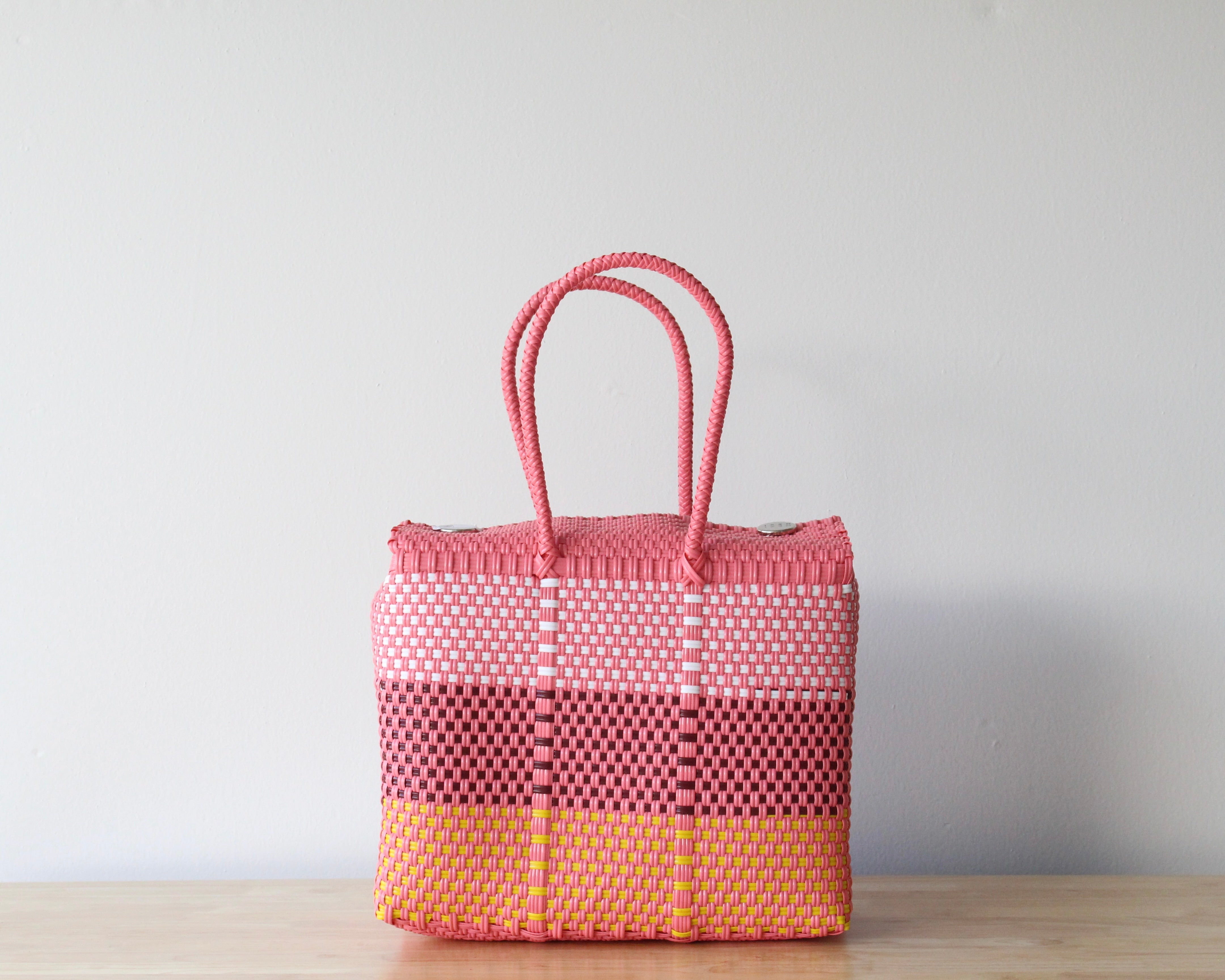 Medium handwoven Mexican handbag in pink, coral and yellow