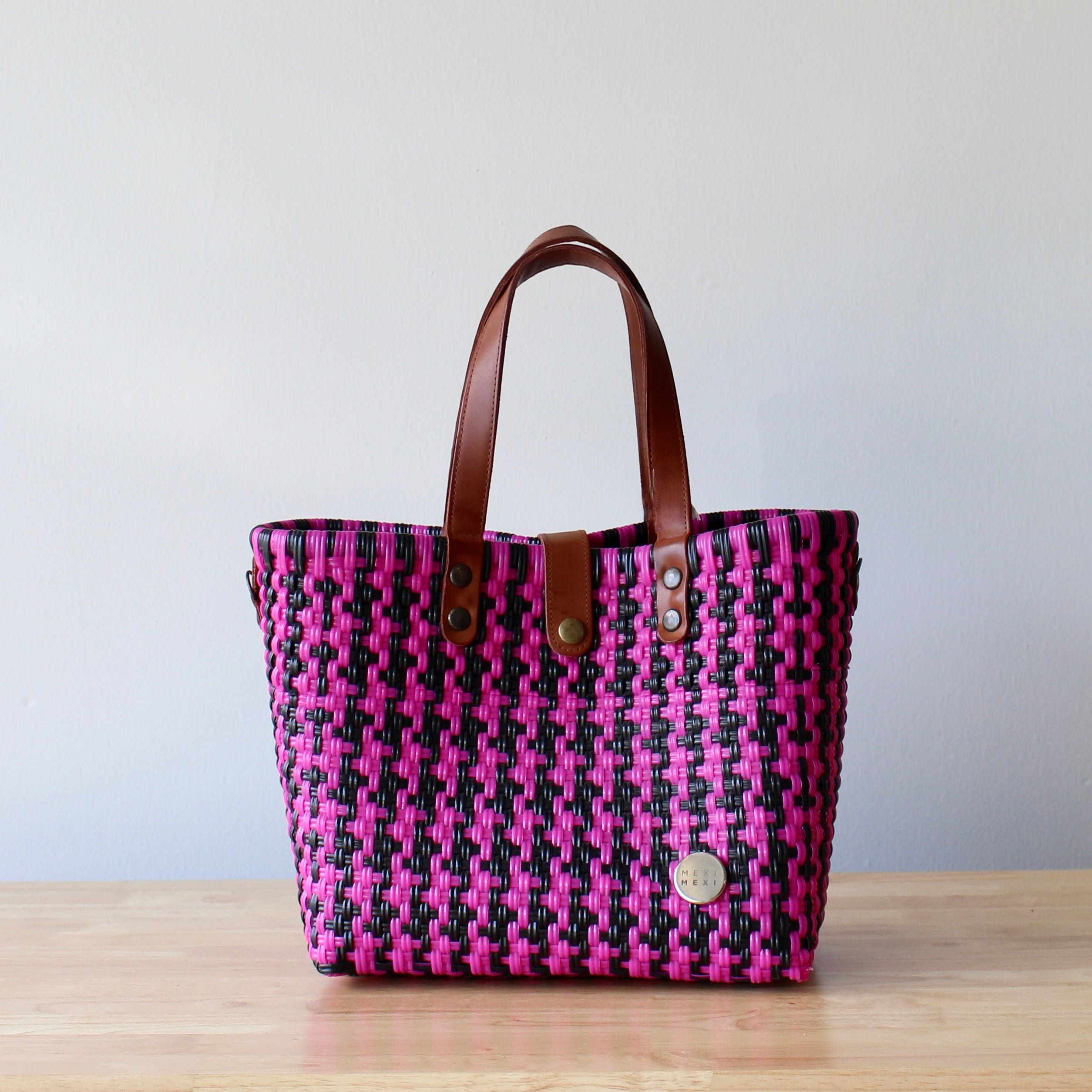Handwoven maroon, gold, and beige Mexican purse with leather straps