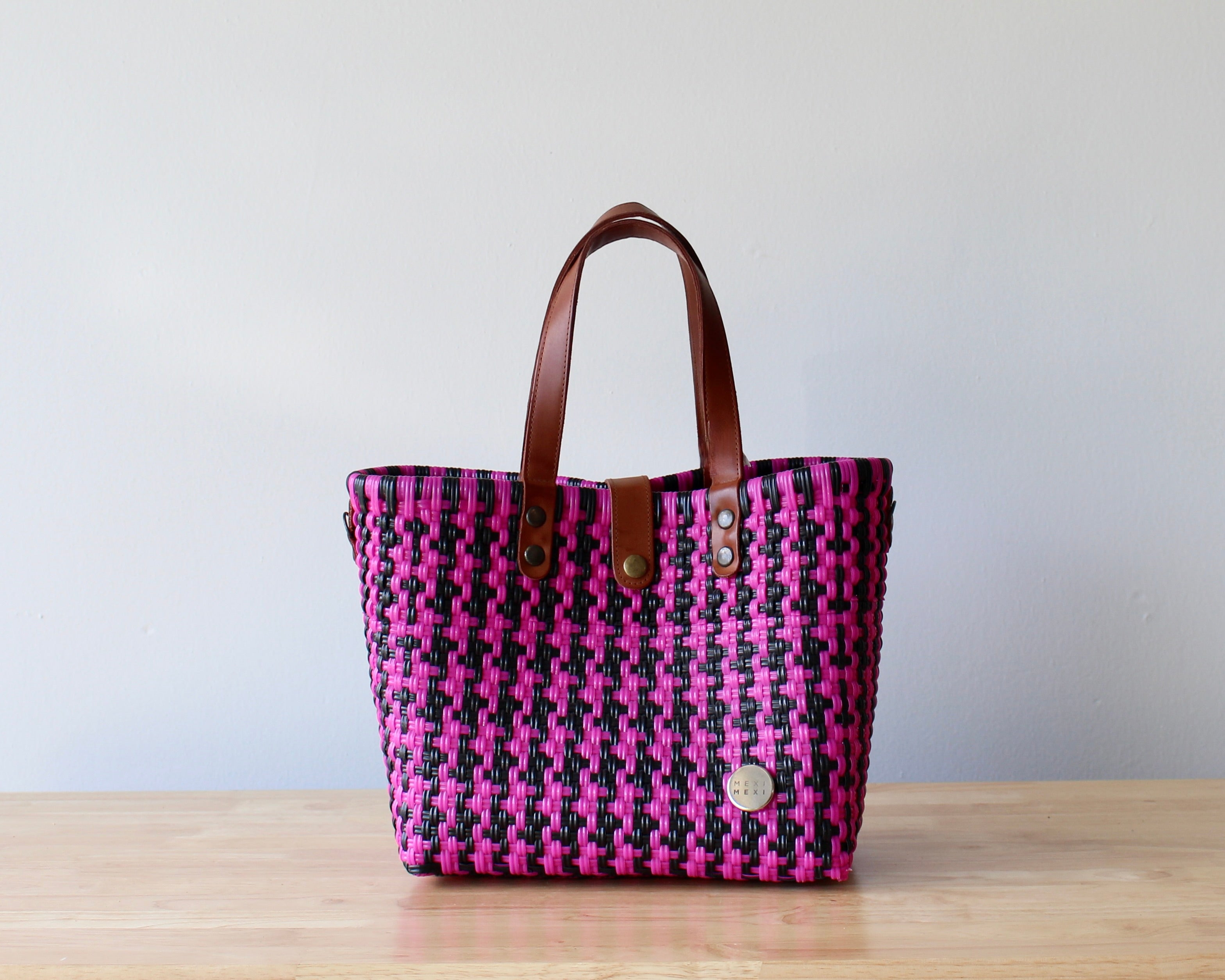 Handwoven maroon, gold, and beige Mexican purse with leather straps