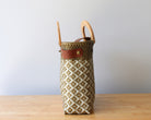 Handmade recycled plastic tote bag in earthy tones