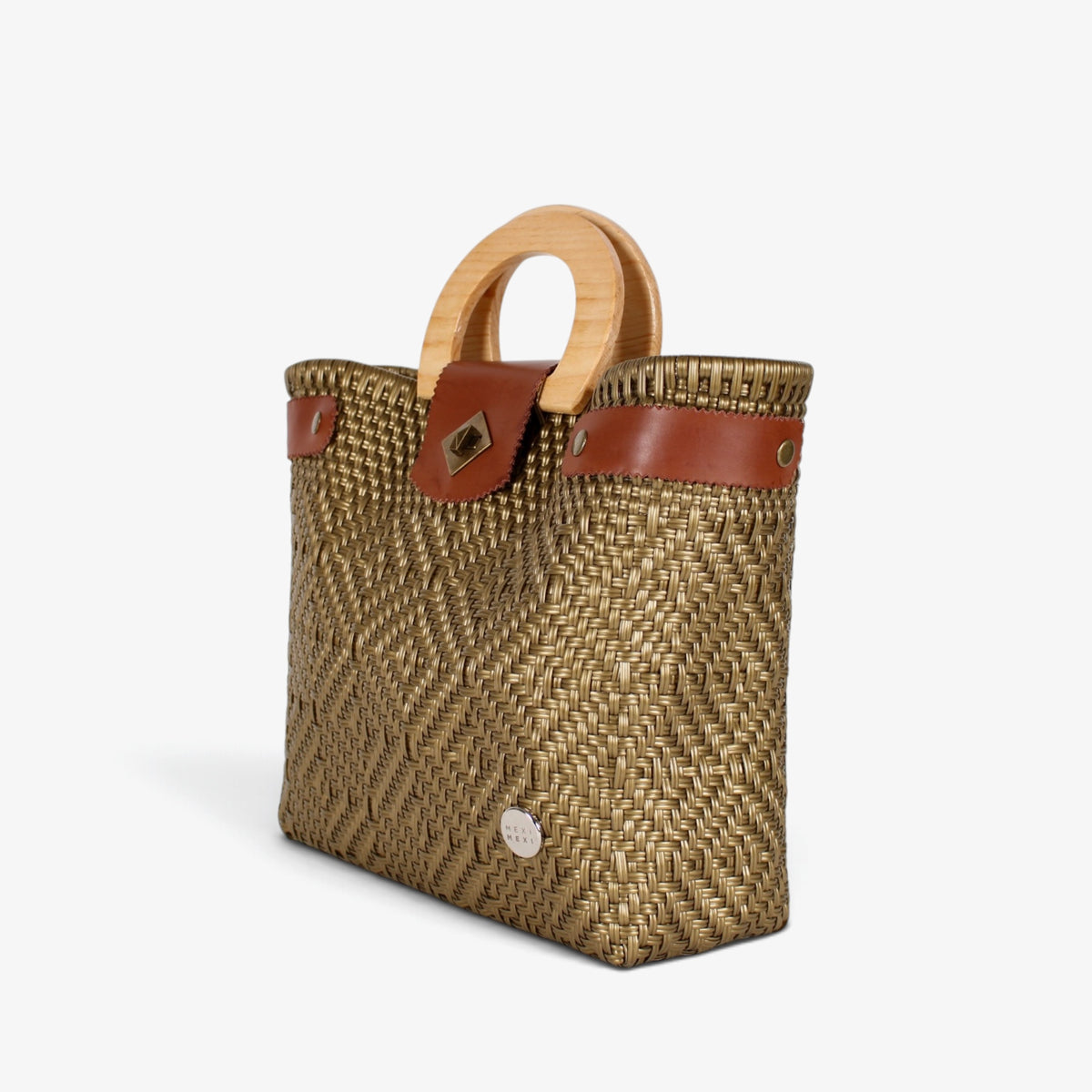 Gold handwoven basket bag with wood handles and brass-tone twist lock, angled view