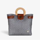 Carmen silver gray Mexican basket bag with natural wood handles, front view