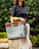 Silver Gray Carmen Mexican basket bag with wood handles, lifestyle photo