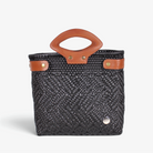 Laura Maria charcoal gray Mexican basket bag with brown genuine leather handles, front view