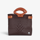 Laura Maria chocolate brown Mexican basket tote with brown genuine leather handles, front view