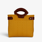 Laura Maria mustard yellow Mexican basket bag with brown genuine leather handles, front view