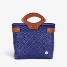 Laura Maria royal blue Mexican basket tote with brown genuine leather handles, front view