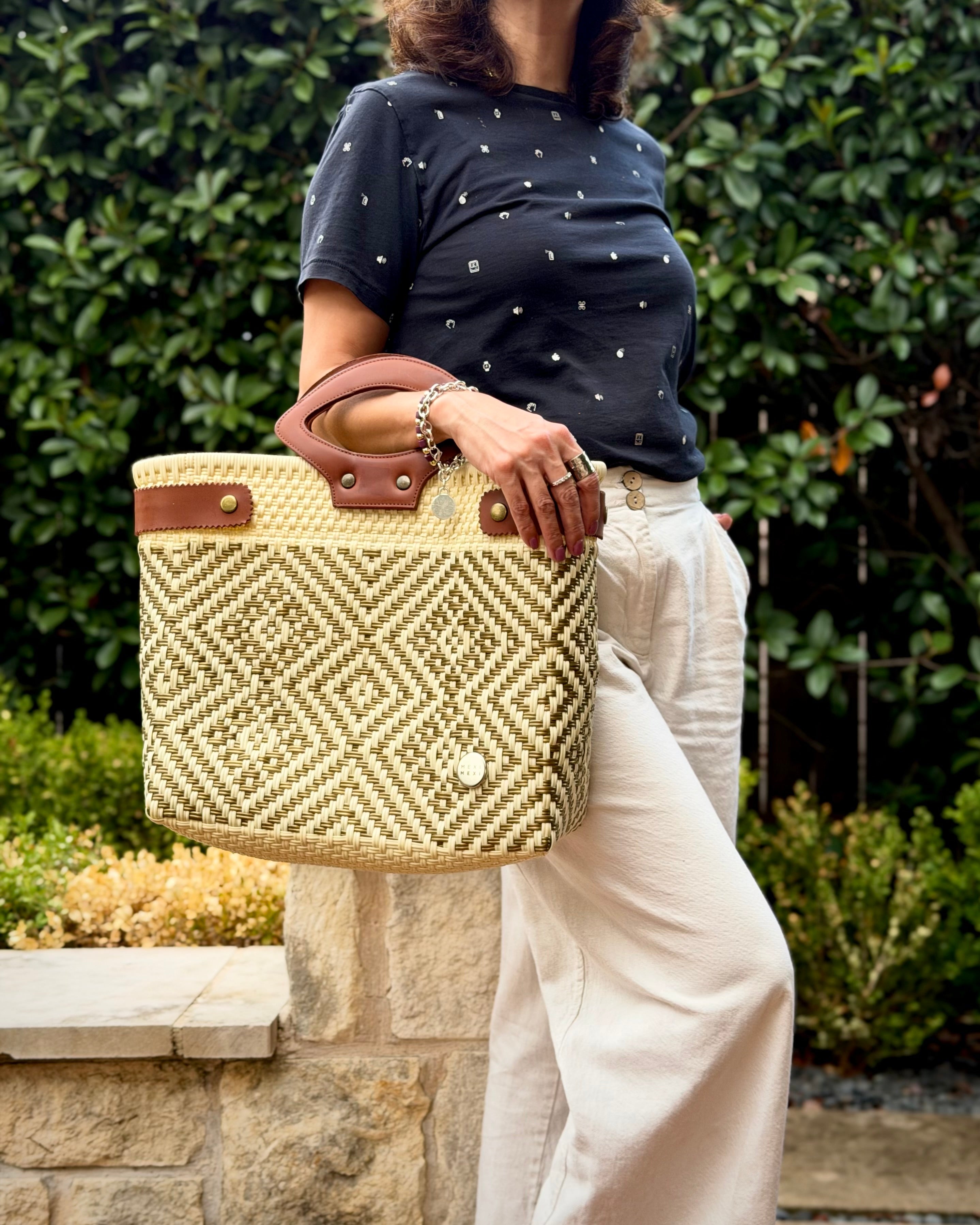 Natural Diamond Laura Maria Mexican basket tote with brown leather handles, lifestyle photo