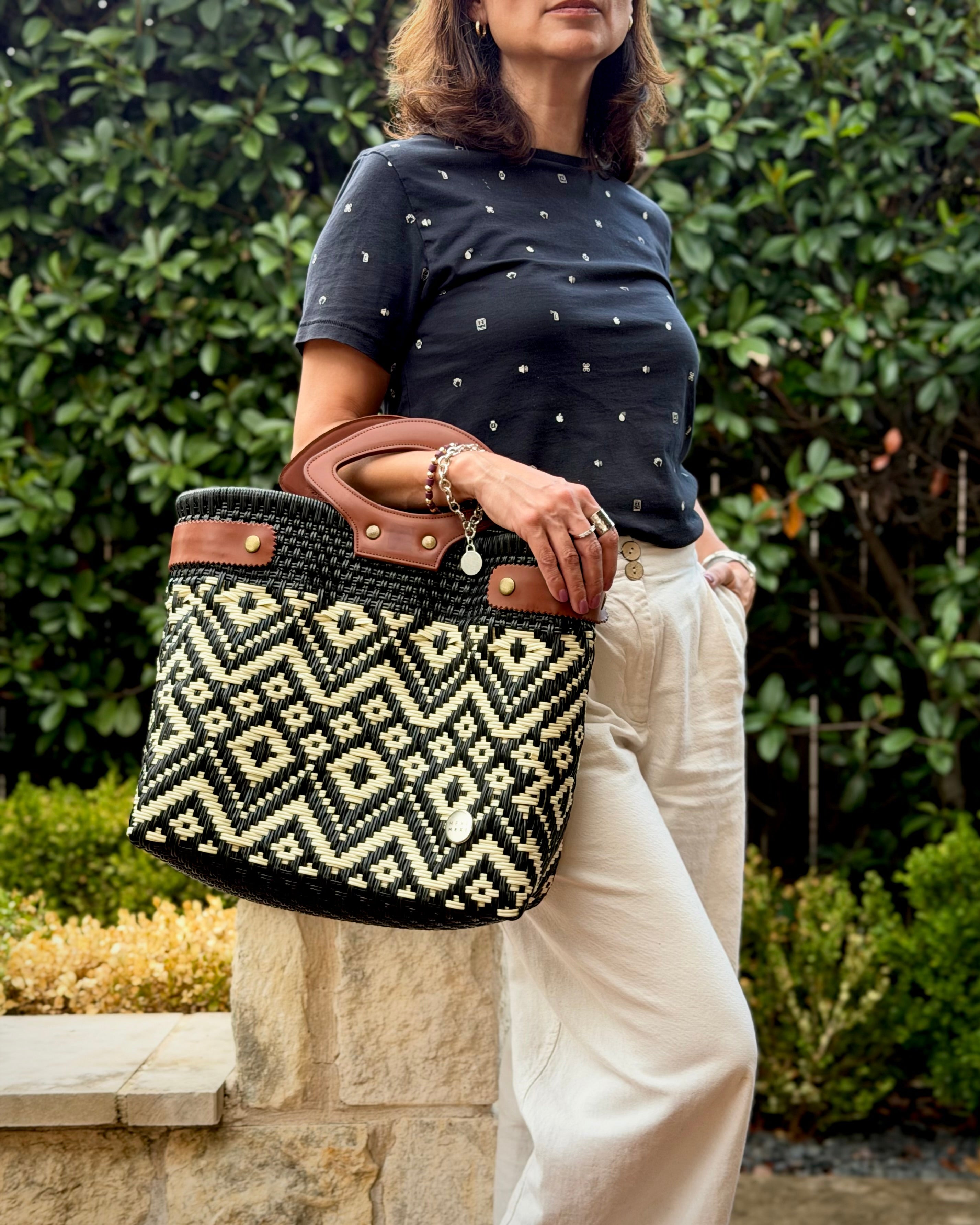Black & Ivory Diamond Laura Maria Mexican basket tote with brown leather handles, lifestyle photo