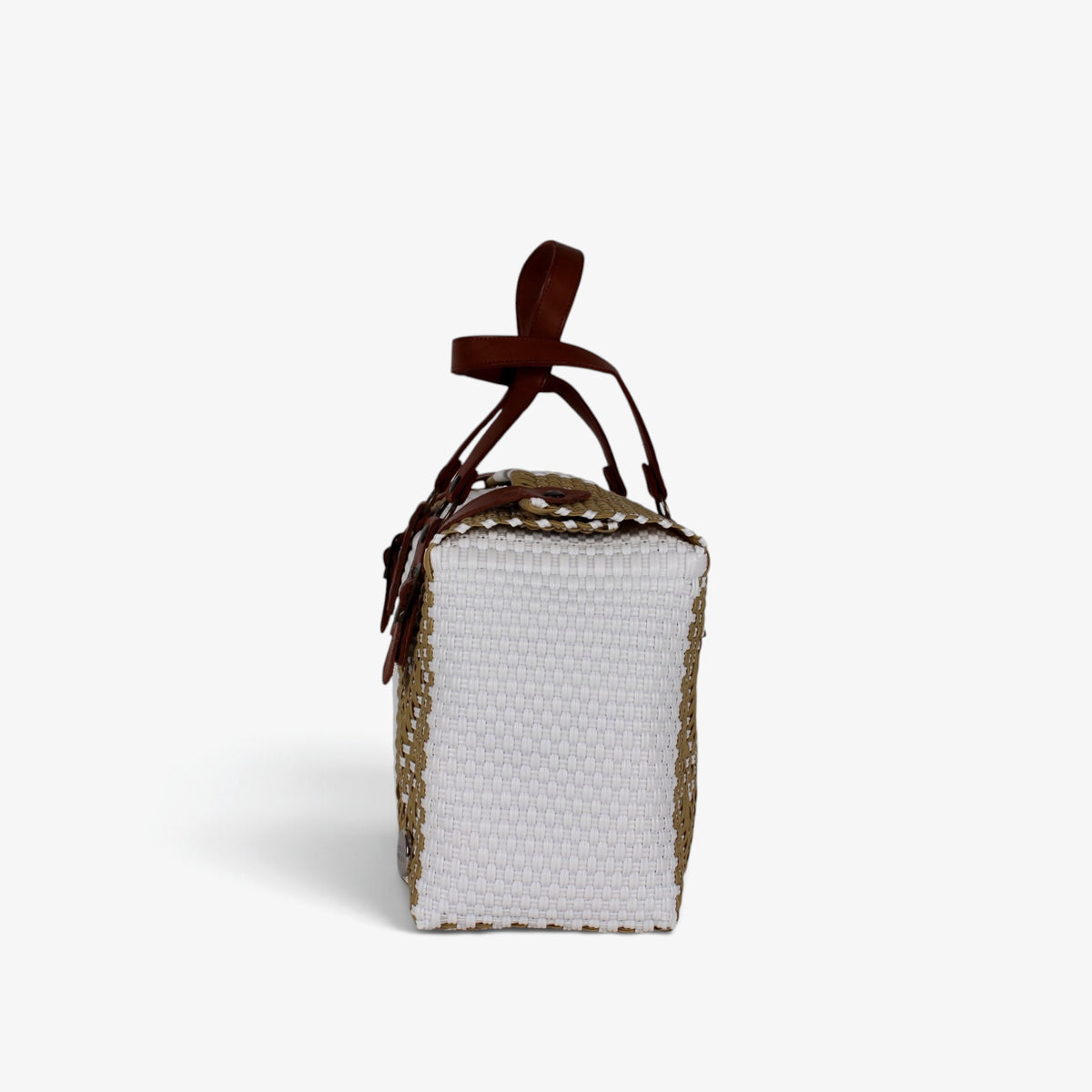 Side view of the white and gold woven handbag with leather flap and snap closure