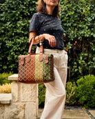 Earth Tones Theresa Mexican handbag with brown leather handles, lifestyle photo