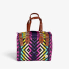 Theresa pink and purple Mexican handbag with brown genuine leather handles, front view