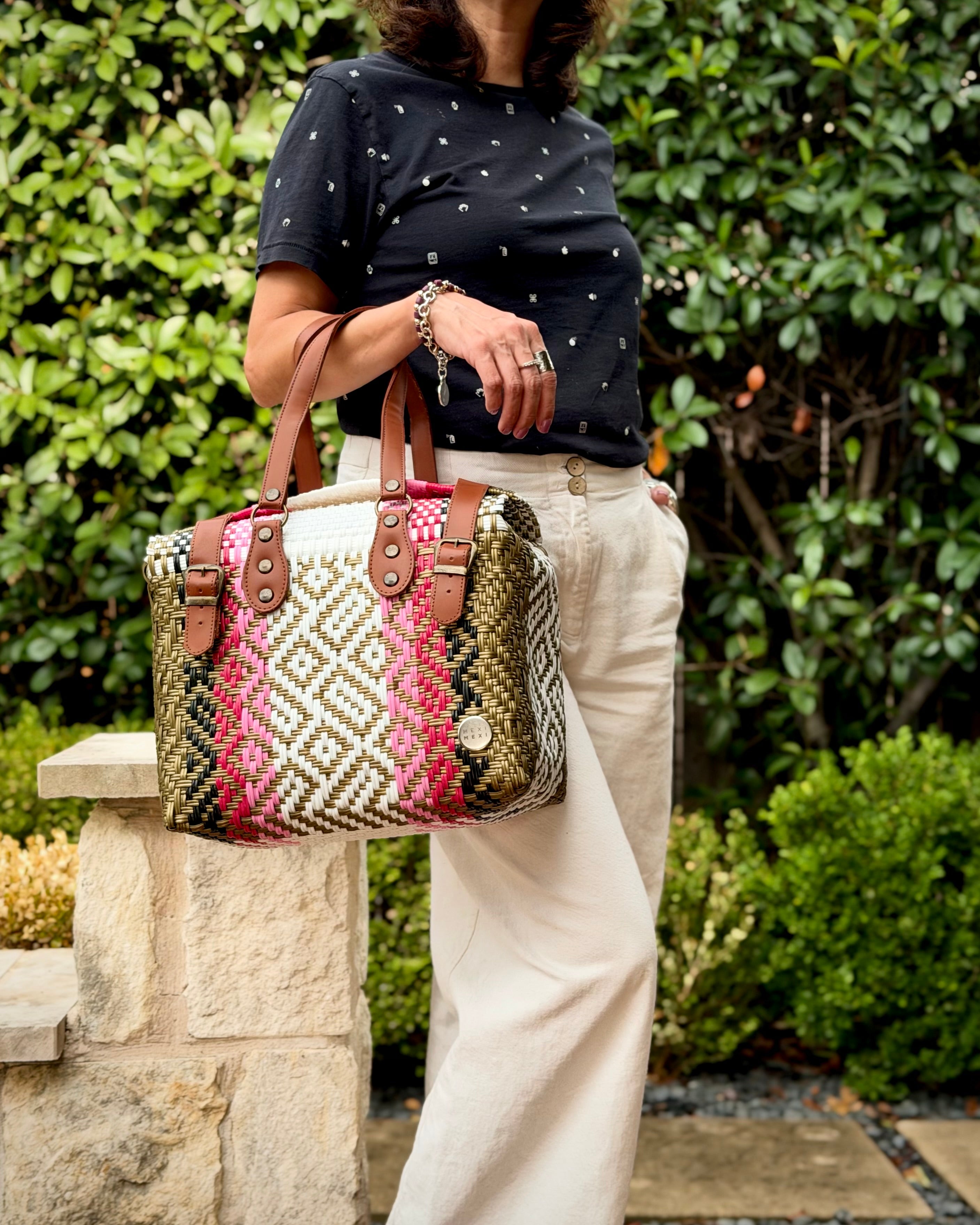 Pink, Gold & White Theresa Mexican handbag with brown leather handles, lifestyle photo