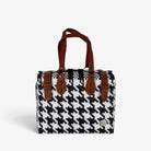 Theresa black and white houndstooth Mexican handbag with brown genuine leather handles, front view