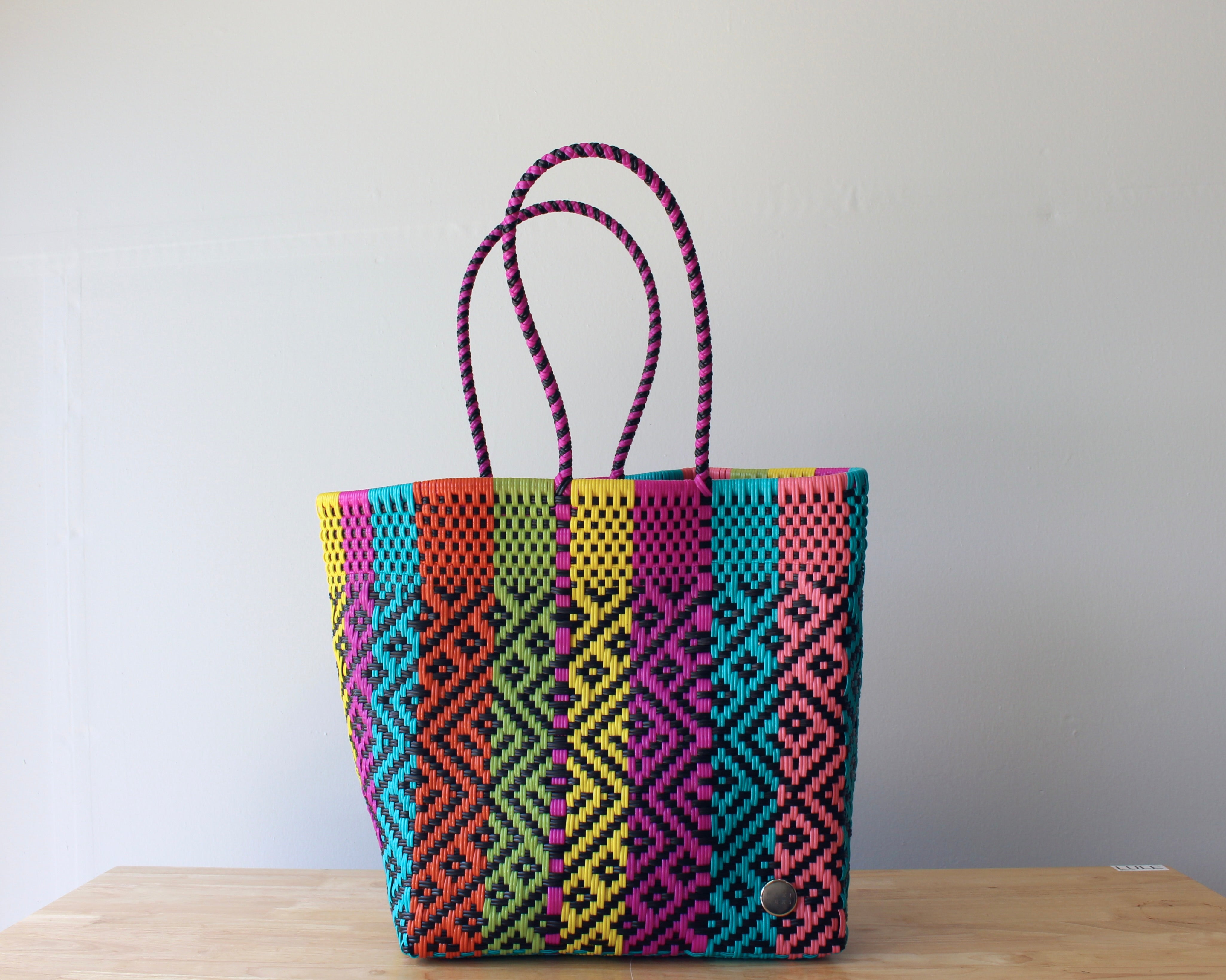 Handwoven Mexican tote bag in rainbow multicolor — artisan woven by MexiMexi, ships from Texas