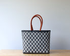 Handwoven  Mexican tote bag in navy and white diamond pattern — artisan woven by MexiMexi