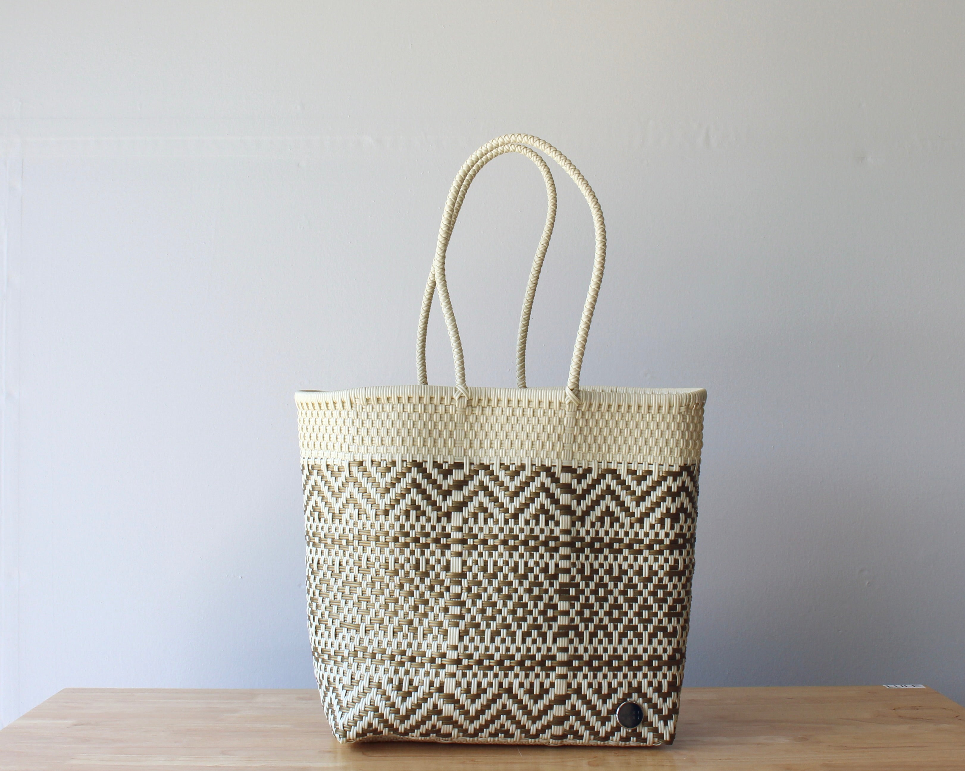 Handwoven Mexican tote bag in natural cream and beige — artisan woven by MexiMexi, ships from Texas