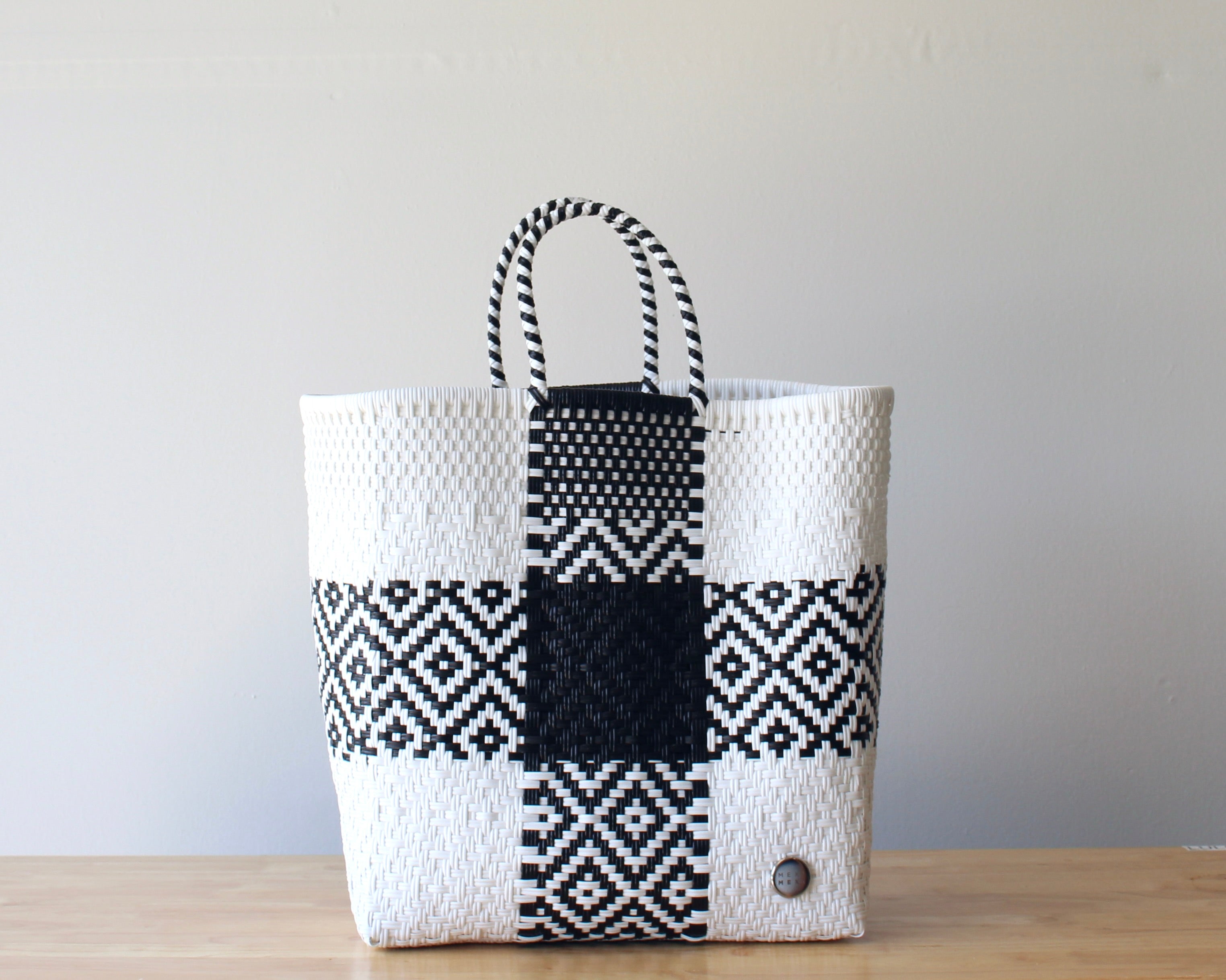Handwoven Mexican tote bag in black and white checkered pattern — artisan woven by MexiMexi