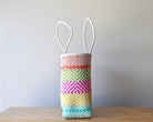 Side view of handwoven Mexican tote — one-of-a-kind artisan bag by MexiMexi