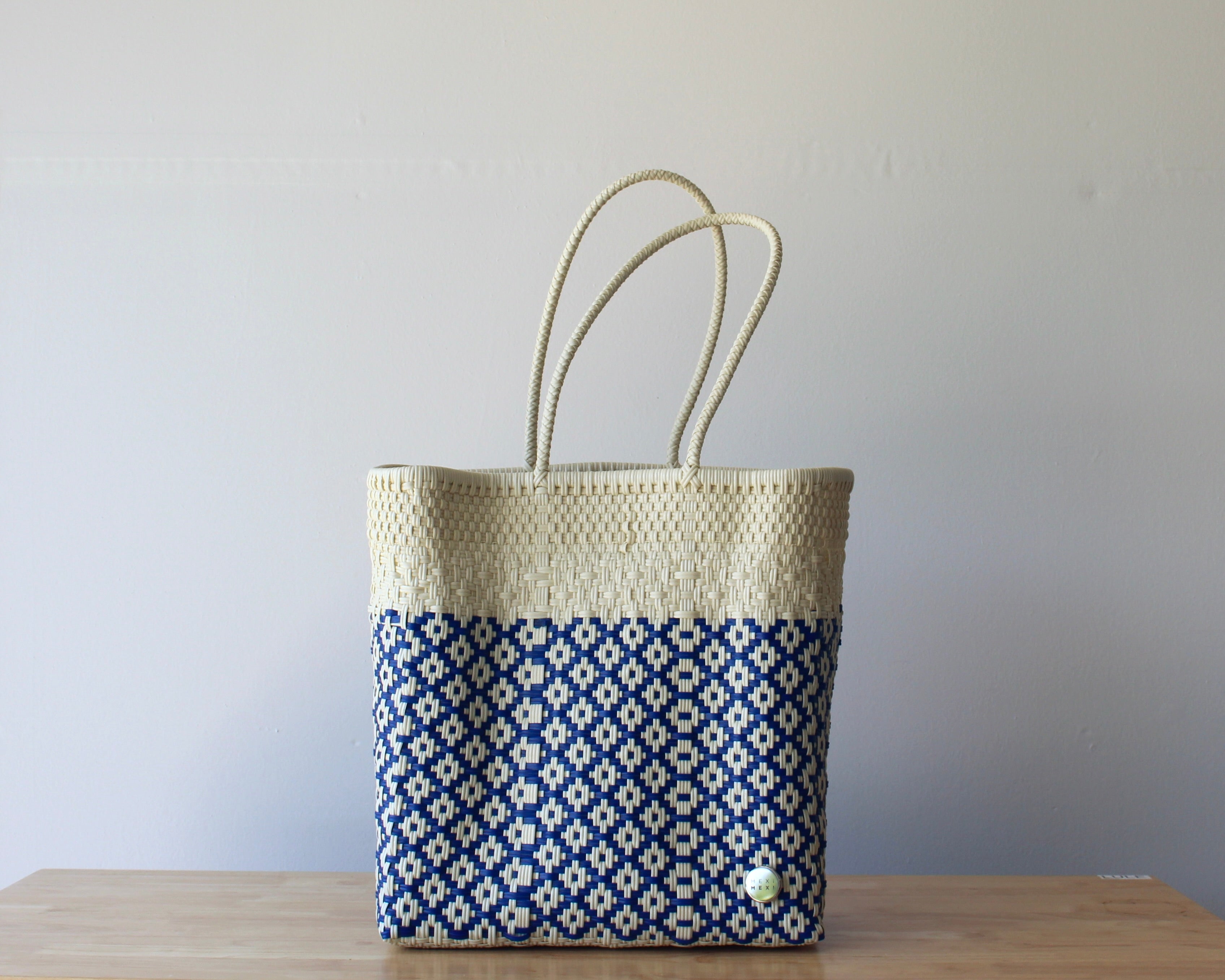 Two-tone ivory and blue handwoven Mexican tote bag — artisan woven by MexiMexi
