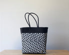 Two-tone black and white handwoven Mexican tote bag — artisan woven by MexiMexi