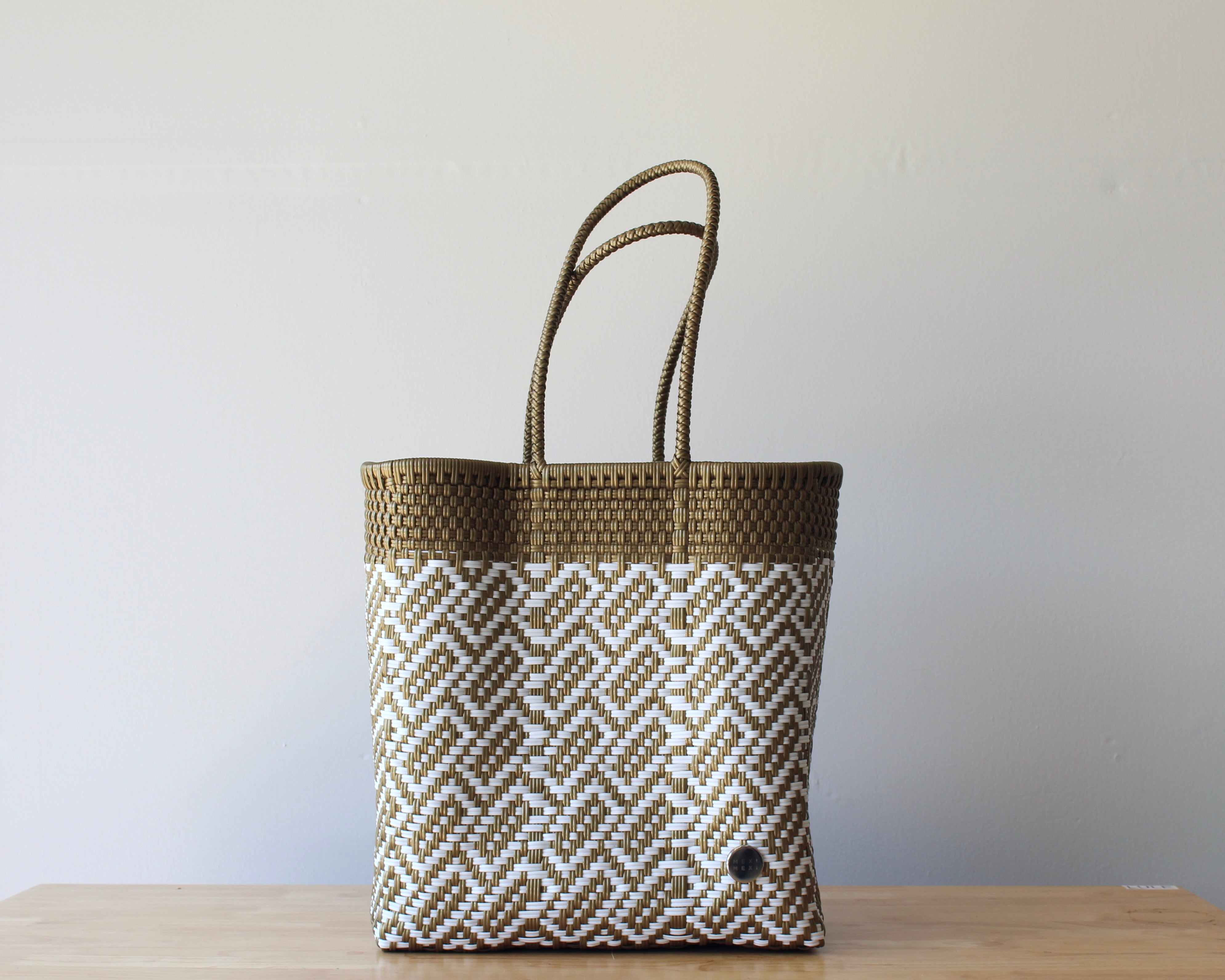 Two-tone gold and white handwoven Mexican tote bag — artisan woven by MexiMexi