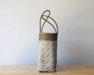 Side view of the two-tone handwoven Mexican tote — one-of-a-kind artisan bag by MexiMexi