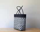 Diagonal view of two-tone woven artisan tote — waterproof MexiMexi bag