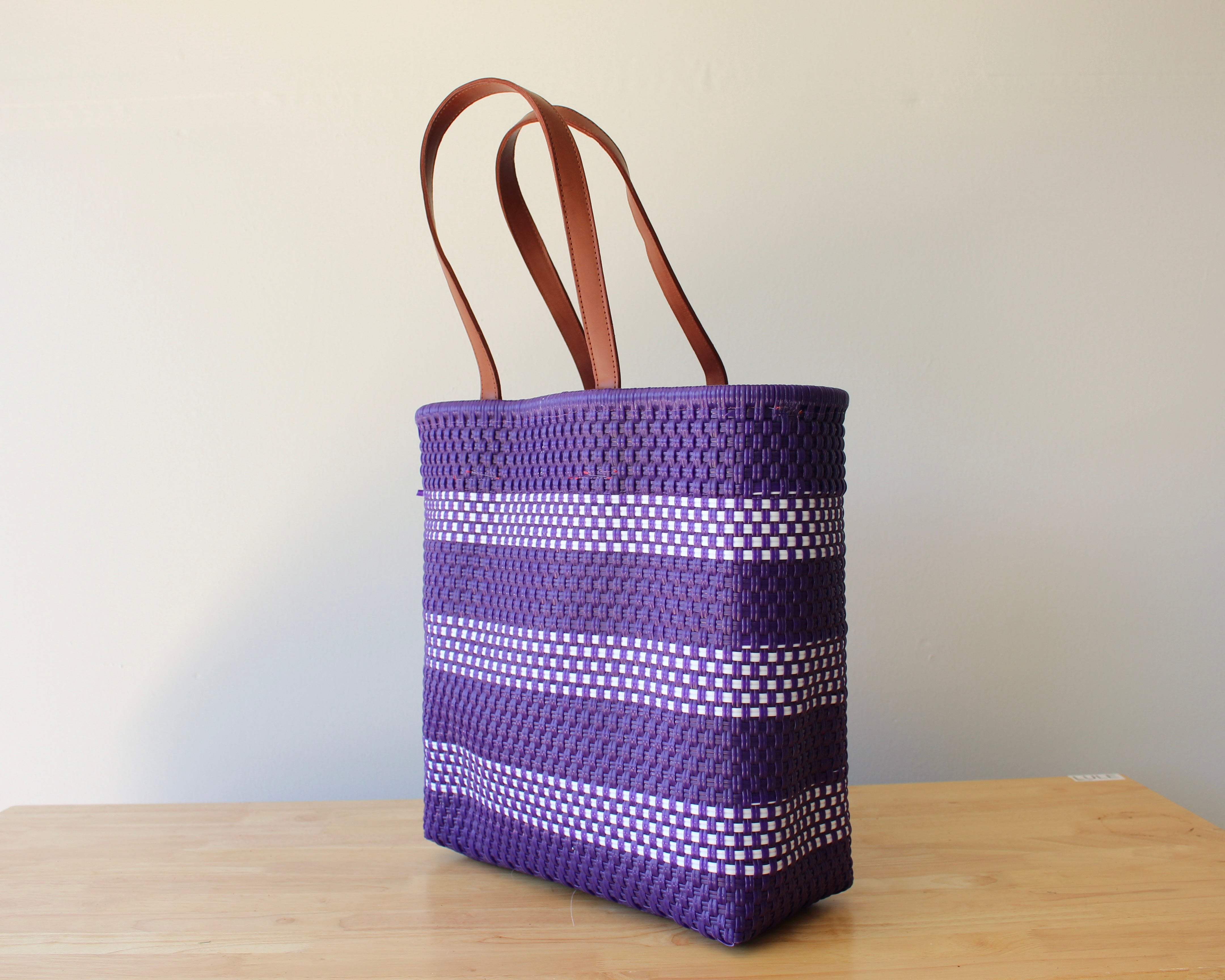 Lavender and white handwoven Mexican tote bag with leather handles — angled view — Alma Rosa, Lavender — MexiMexi