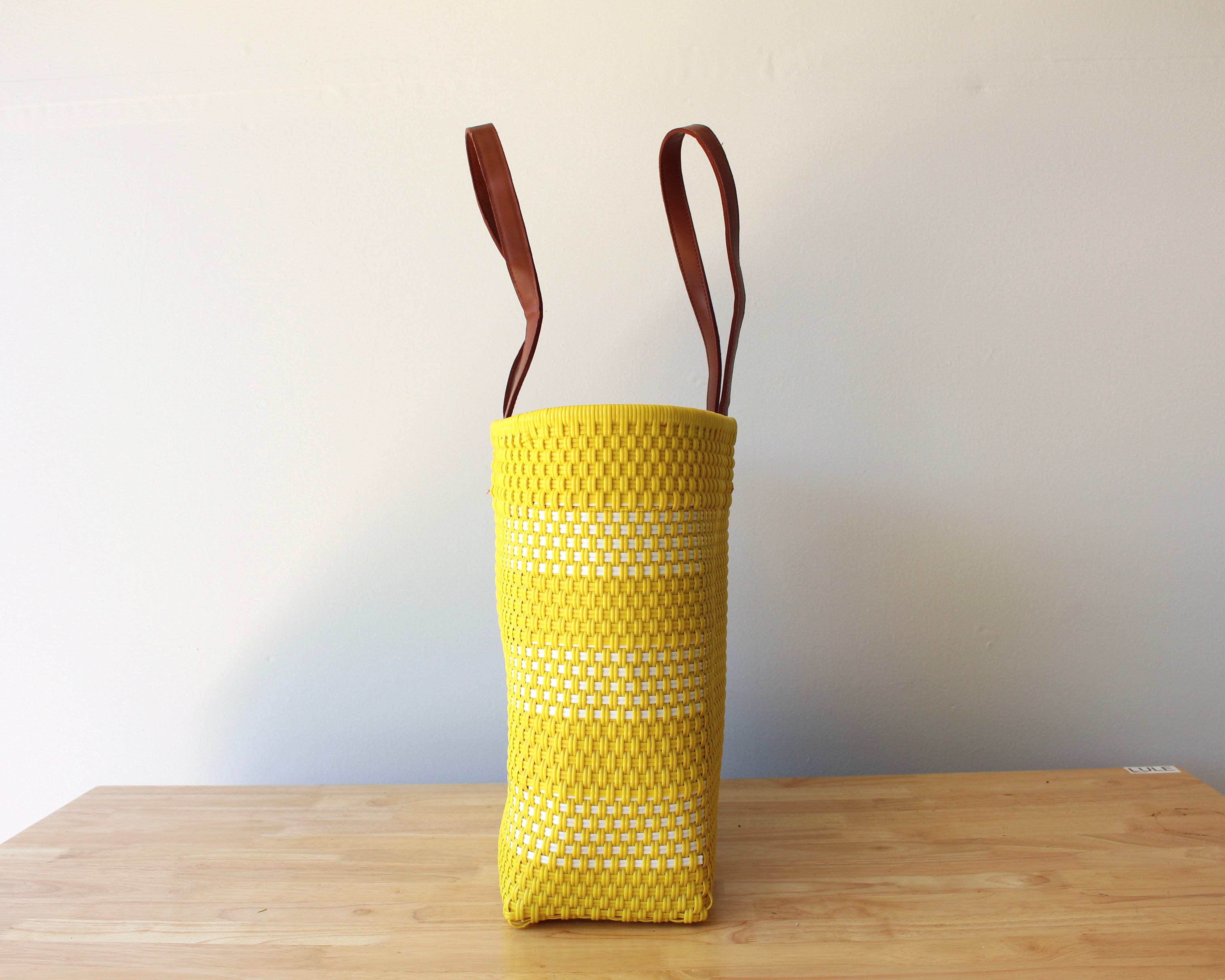 Yellow and white handwoven Mexican tote bag — side view showing woven texture — Alma Rosa, Sunshine — MexiMexi