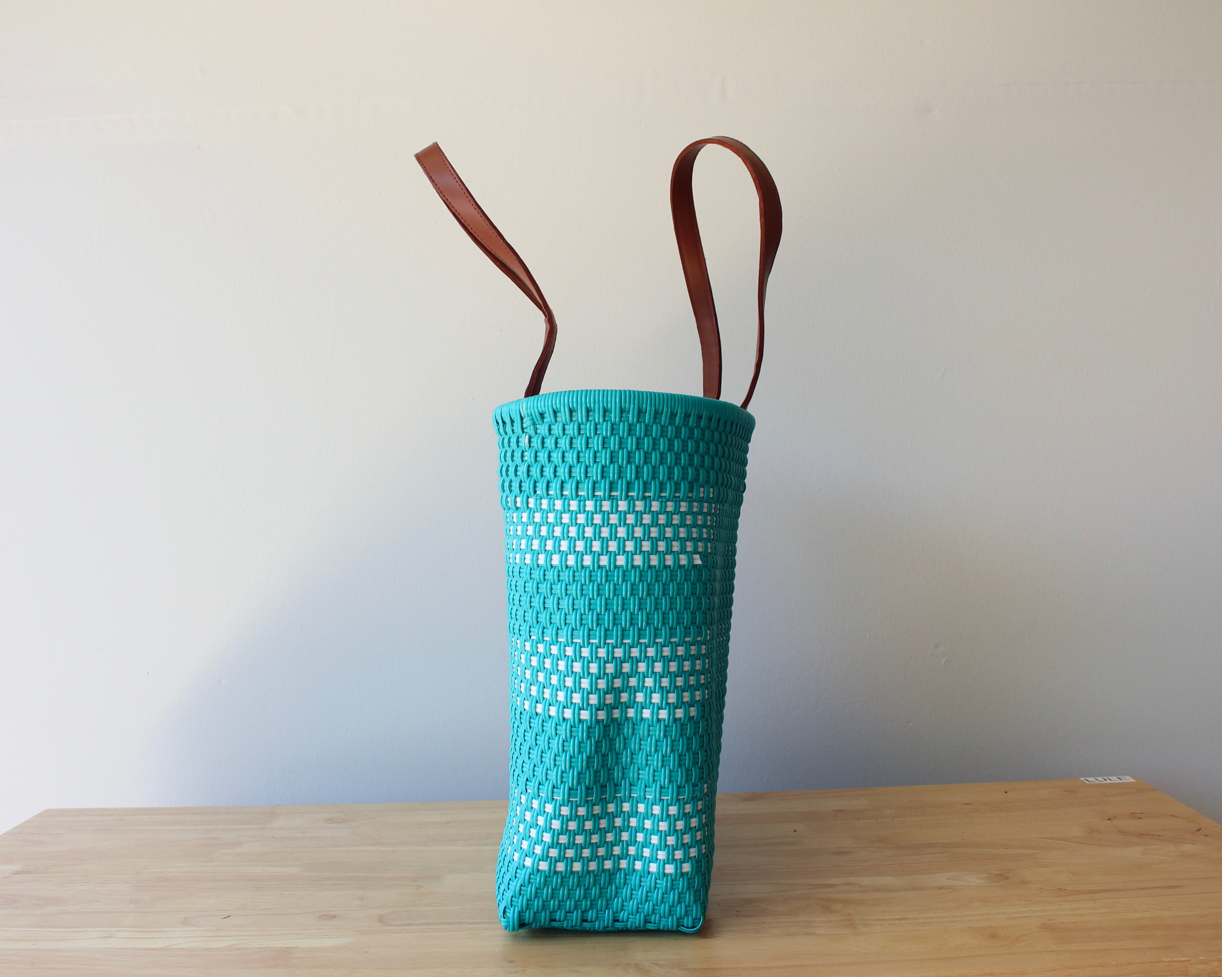 Aqua and white handwoven Mexican tote bag — side view showing woven texture — Alma Rosa, Aqua — MexiMexi