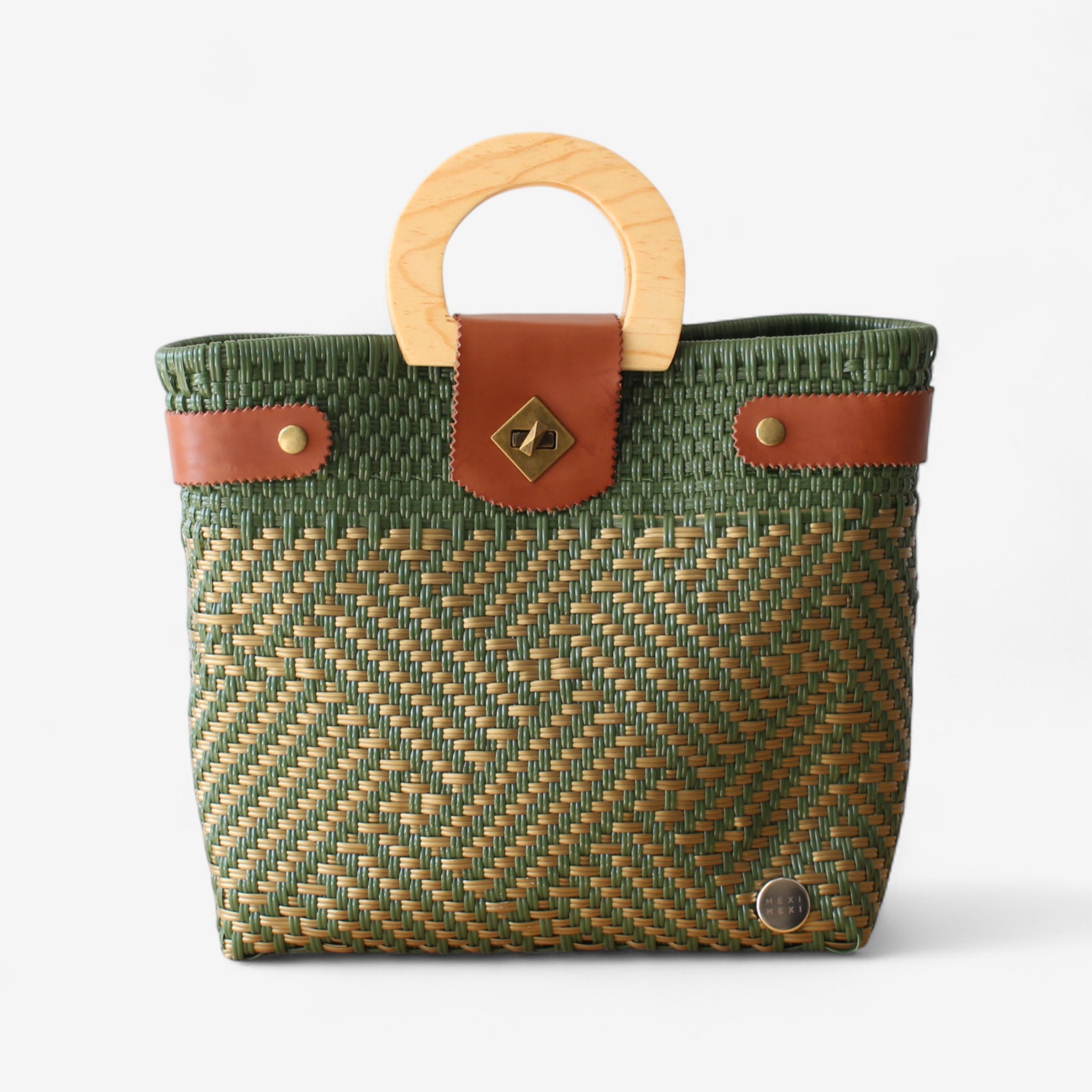 Handmade green woven tote bag with wooden handle and leather details.