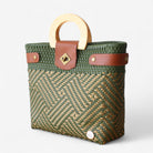 Eco-friendly geometric tote in green with round wooden handles.