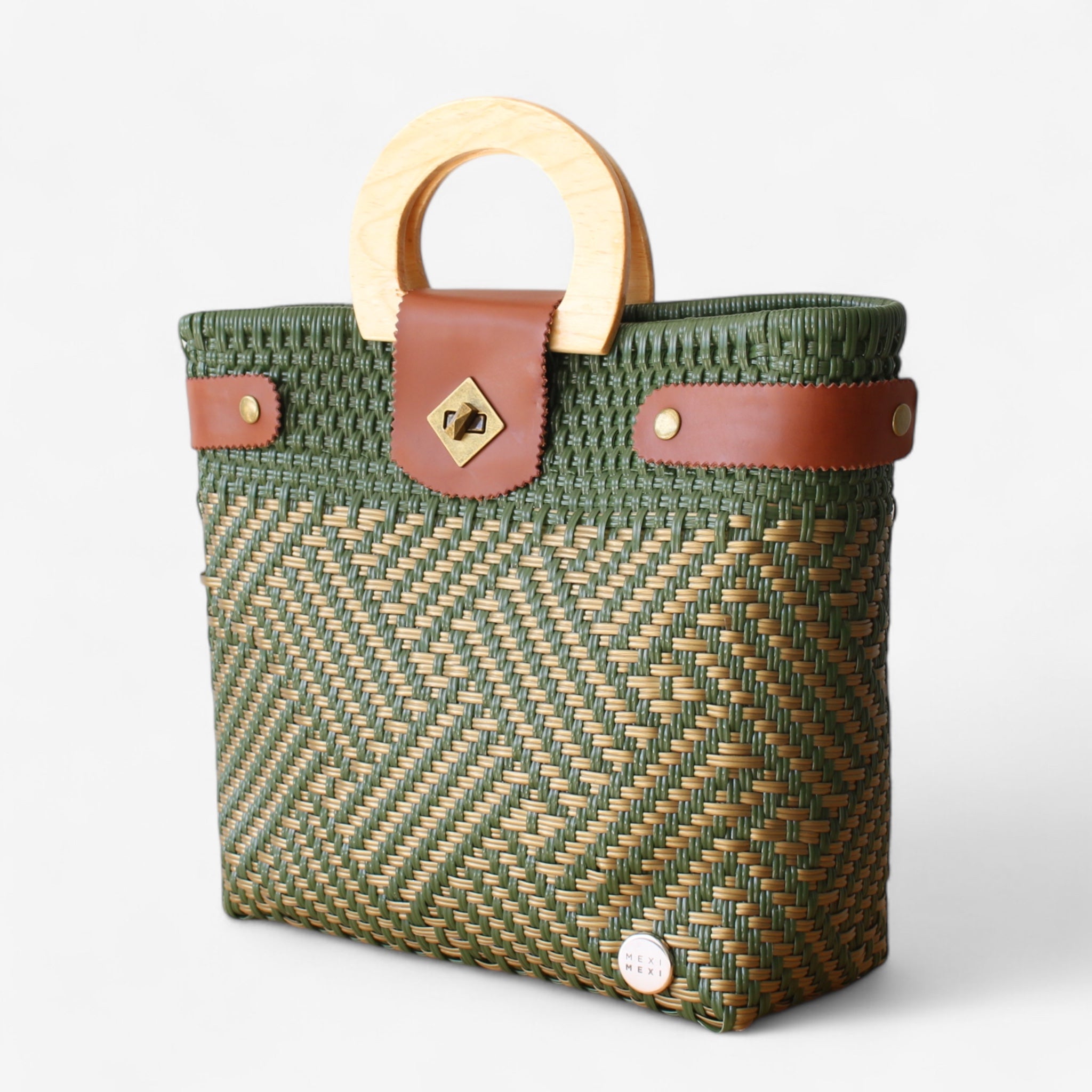 Eco-friendly geometric tote in green with round wooden handles.