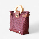 Eco-friendly burgundy market bag handmade from recycled plastic