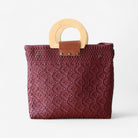 Durable Maroon tote purse with leather strap and wooden handles